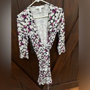 Diane von Furstenberg wrap dress. Navy, white and pink details. Size 6